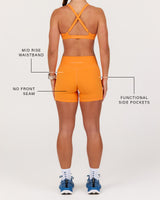 MOTION 360 MID RISE POCKET SHORTS 5" - AR SUNBURST