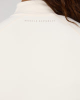 AIRE QUARTER ZIP TOP - VANILLA