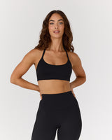 AIRE SCOOP NECK HALTER BRA - BLACK