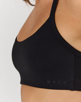 AIRE SCOOP NECK HALTER BRA - BLACK