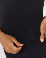 AIRE SCOOP NECK HALTER TOP - BLACK
