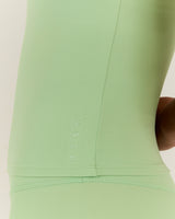 AIRE V NECK CROSS BACK TOP - MATCHA