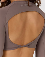 ATHLEISURE TWIST BACK LONG SLEEVE TOP - PEPPERCORN