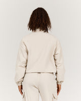 CROPPED WOVEN TRACK JACKET - SANDSTONE