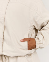 CROPPED WOVEN TRACK JACKET - SANDSTONE