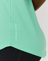 INTERVAL LONGLINE SINGLET - CYBER MINT