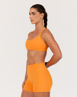 MOTION 360 CROSS BACK RUNNING BRA - AR SUNBURST