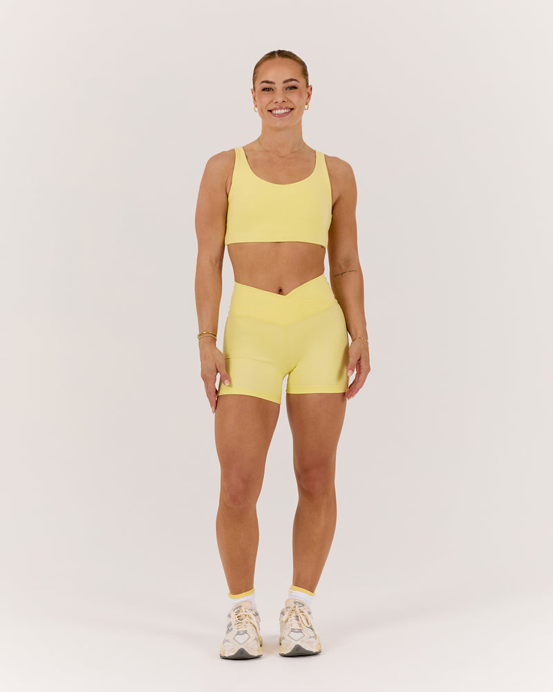 MOTION 360 CROSSOVER SHORTS 4" - LEMON