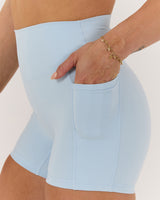 MOTION 360 POCKET SHORTS 4" - ICE BLUE