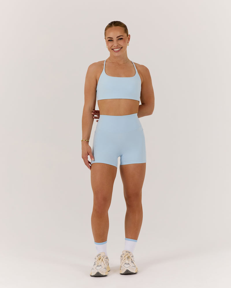 MOTION 360 POCKET SHORTS 4" - ICE BLUE