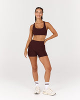MOTION 360 POCKET SHORTS 4" - RAISIN