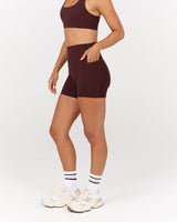 MOTION 360 POCKET SHORTS 4" - RAISIN