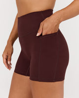 MOTION 360 POCKET SHORTS 4" - RAISIN