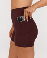 MOTION 360 POCKET SHORTS 4" - RAISIN