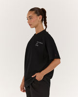 OVERSIZED WE MOVE AS ONE TEE - BLACK