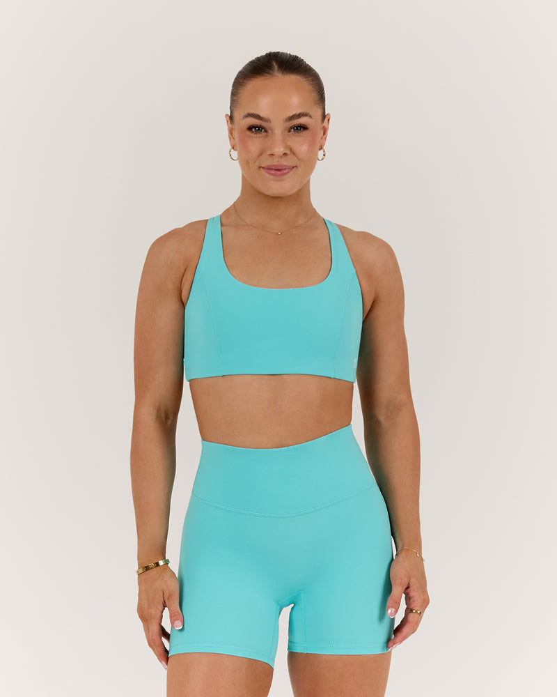 SCULPT CROSS BACK BRA - CAPRI