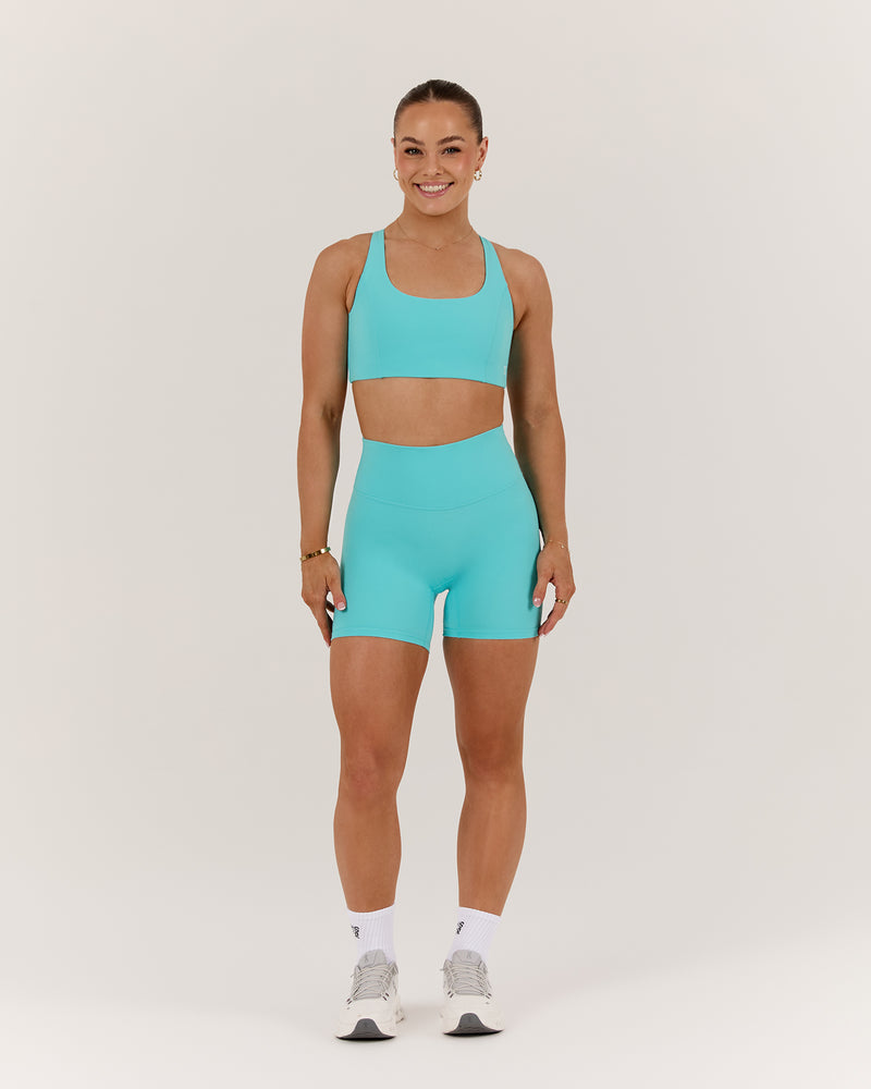 SCULPT CROSS BACK BRA - CAPRI